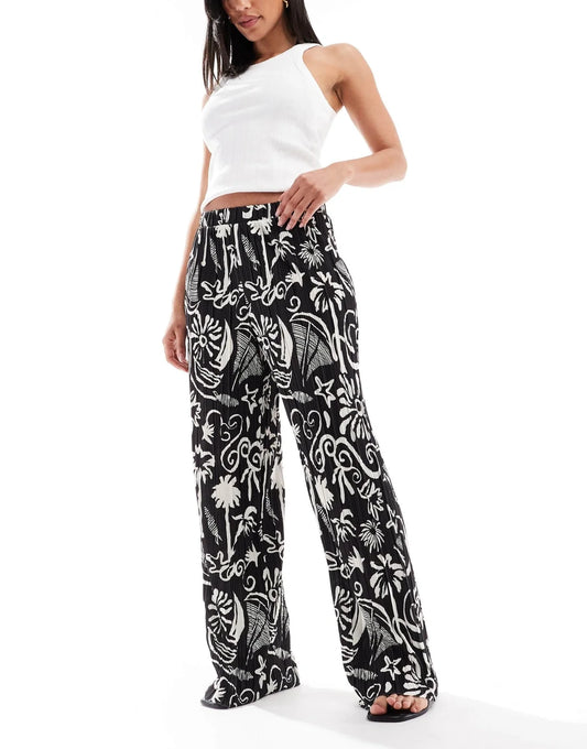 Vero Moda high waist wide leg plisse trouser in tropical conversational print